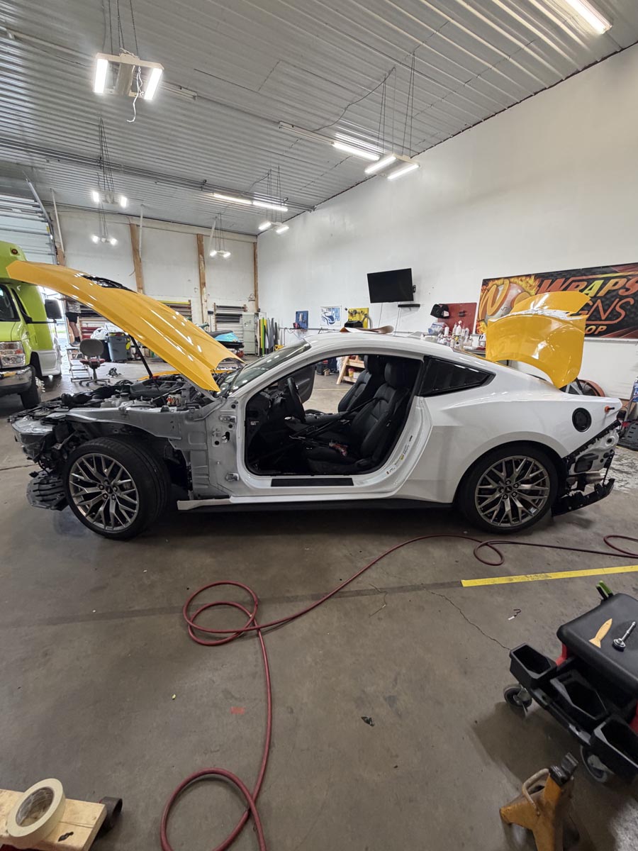 2026 White Mustang in the process of getting a full color change yellow wrap