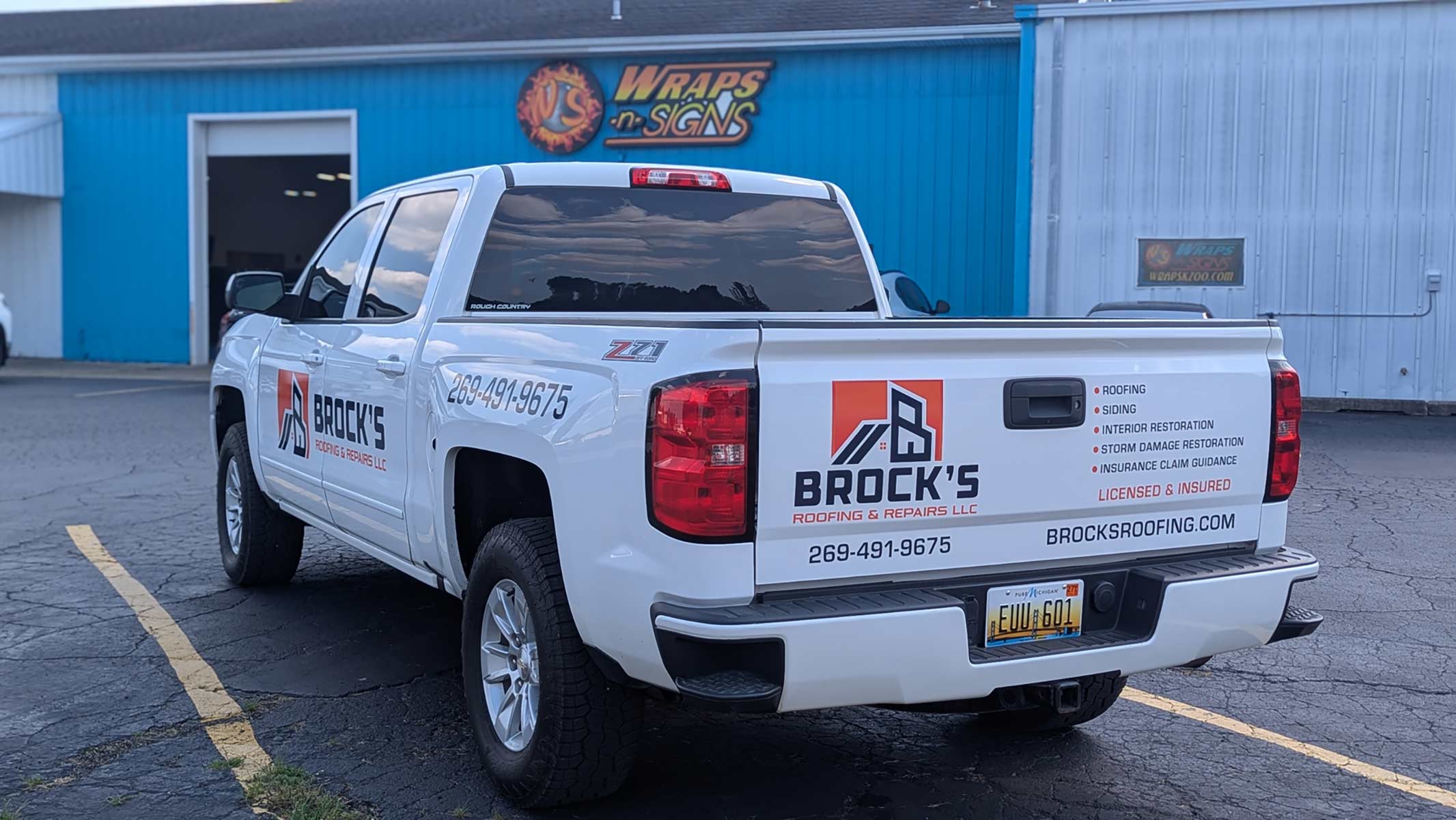 Brocks Roofing truck rear view